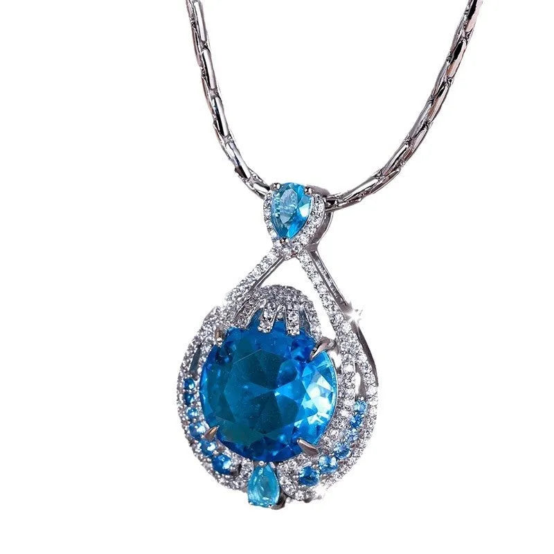 Blue fireworks-cut gem geometric pendant necklace on water wave chain for women