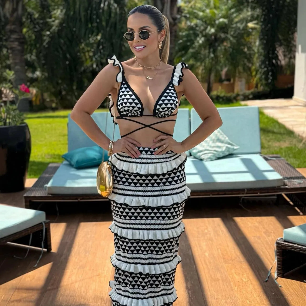 Black and white striped bikini set with ruffled spaghetti straps top and long knitted skirt for women