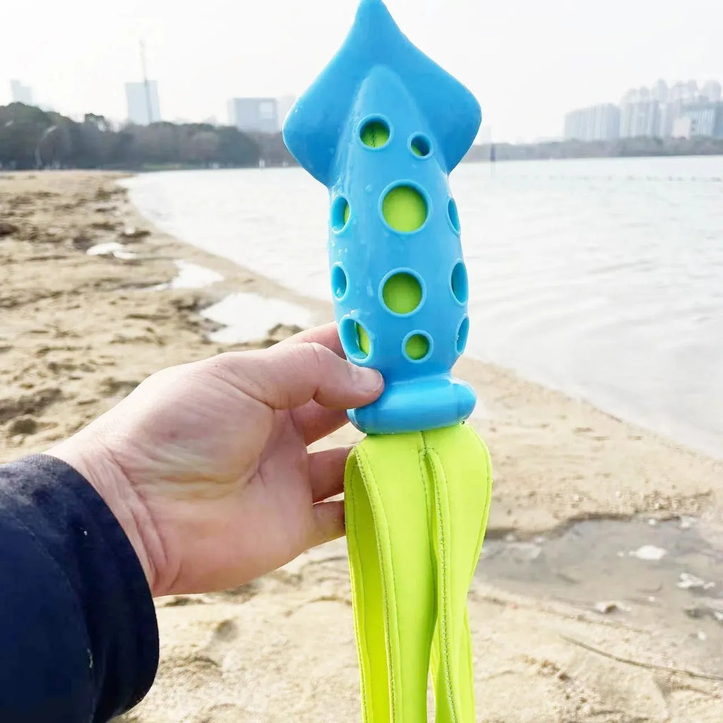 Blue dog chew toy shaped like a cuttlefish with squeaker for teeth cleaning and interactive play