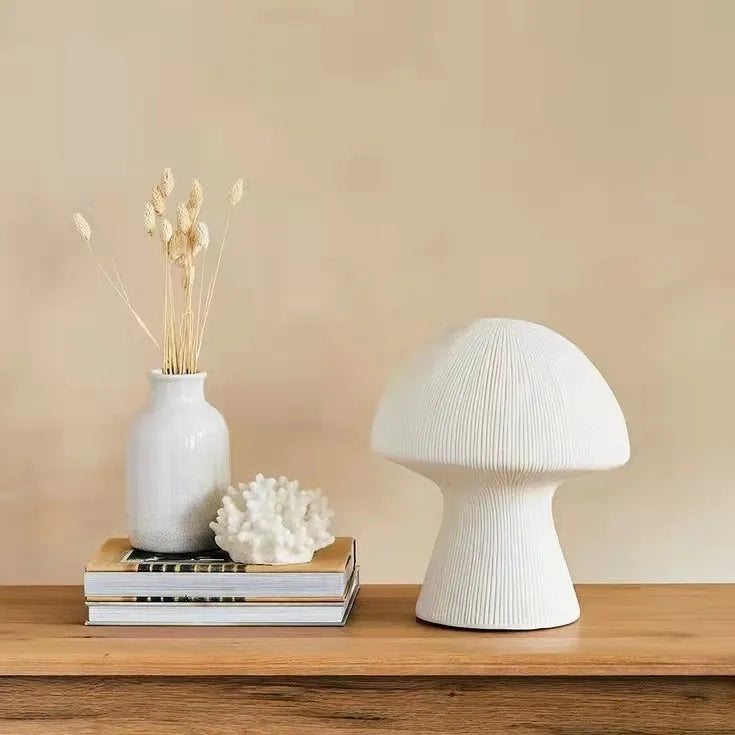 Nordic style handmade sandstone bedside table lamp with adjustable three-color light on a bedroom side table