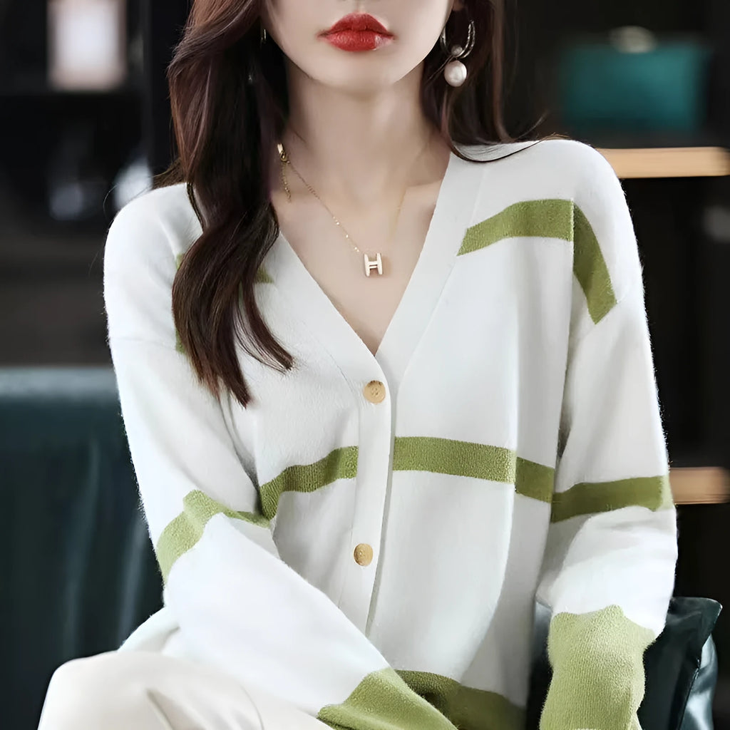 Women's black and white 3D striped knitted cardigan with button front and V-neck on a slim fit.