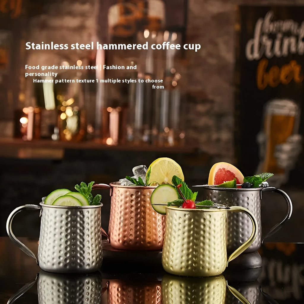 Stainless steel Moscow mule cup with copper plating in hammer point design, shown in a rose gold finish.