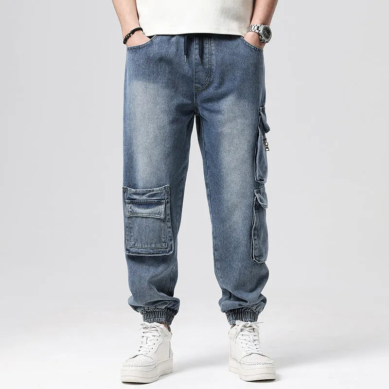 Hip hop retro multi-pocket denim pants in high waist loose fit, front view showing multiple pockets and straight leg style