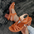 Women's black peep toe wedge platform sandals with a silver buckle fastener