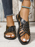 Flat buckle open toe cross strap lightweight beach slippers in black, side view
