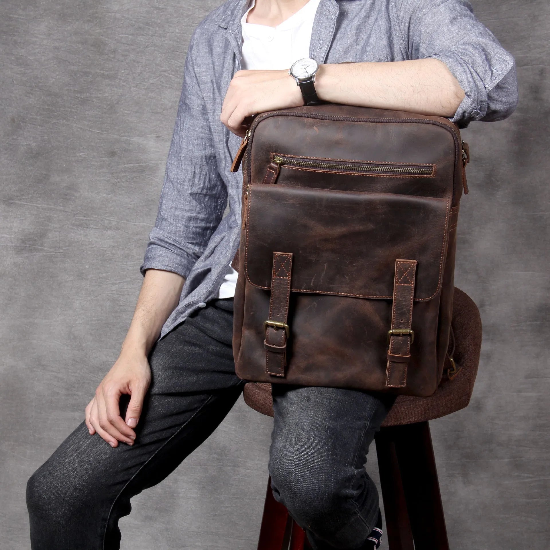Retro crazy horse leather backpack in dark coffee colour with handmade stitching and front flap