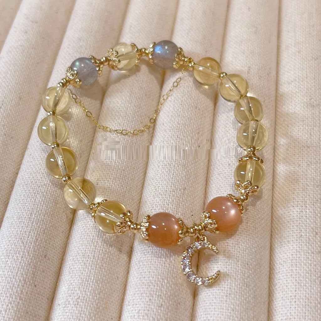 Chinese style crystal bracelet with 14K gold electroplating and citrine moonstone beads in diamond shapes