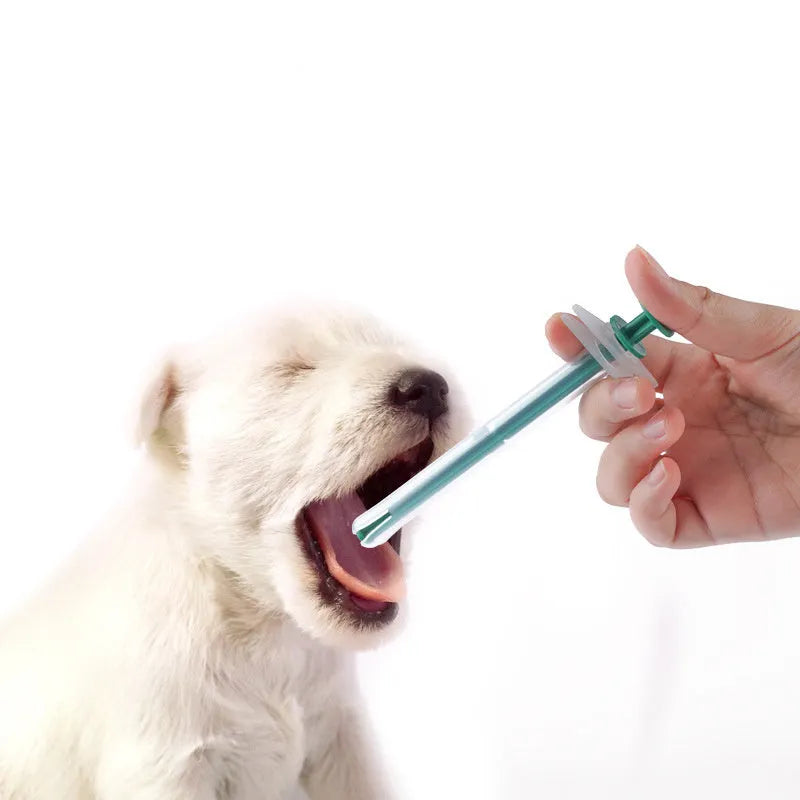 Two pet pill shooter guns with soft silicone tips in different sizes for cats and dogs
