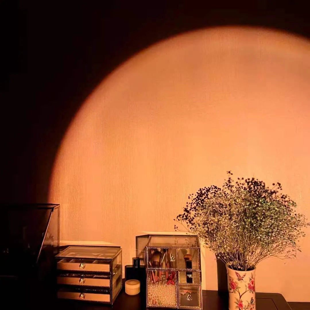 Rechargeable sunset red projection lamp casting rainbow light with push-button switch and USB cable