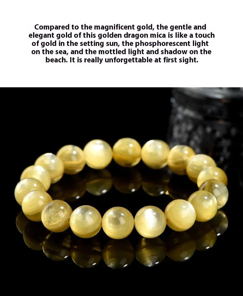 Polished natural mica round beads bracelet in yellow Lepidolite colour on flat surface