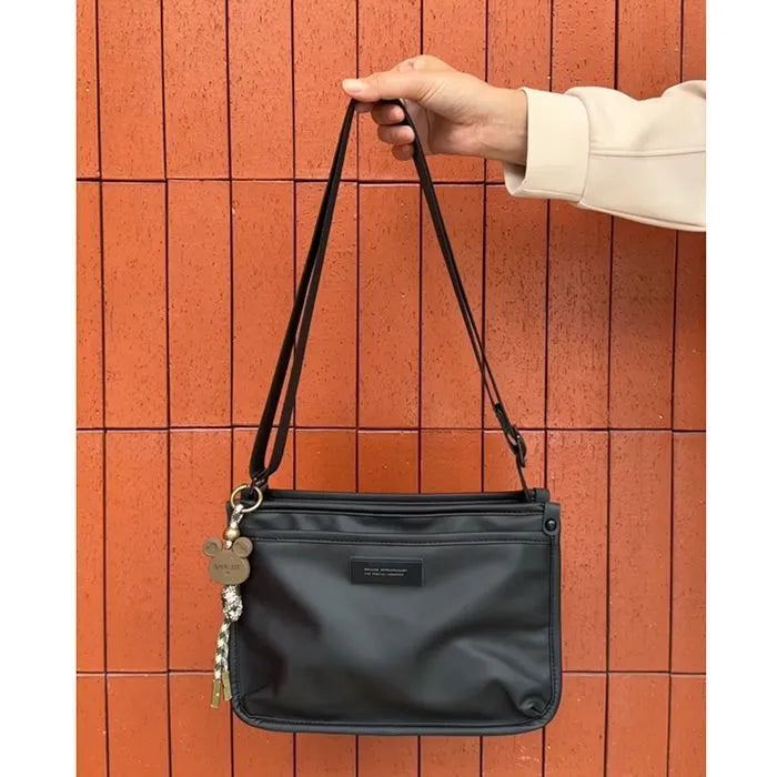 Unisex casual retro crossbody bag in Oxford cloth, small square shape, cool trendy style, single bag without ornaments
