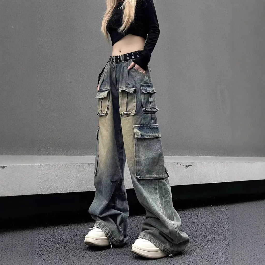 Loose fit multi-pocket distressed denim jeans in light blue wash straight-leg street style