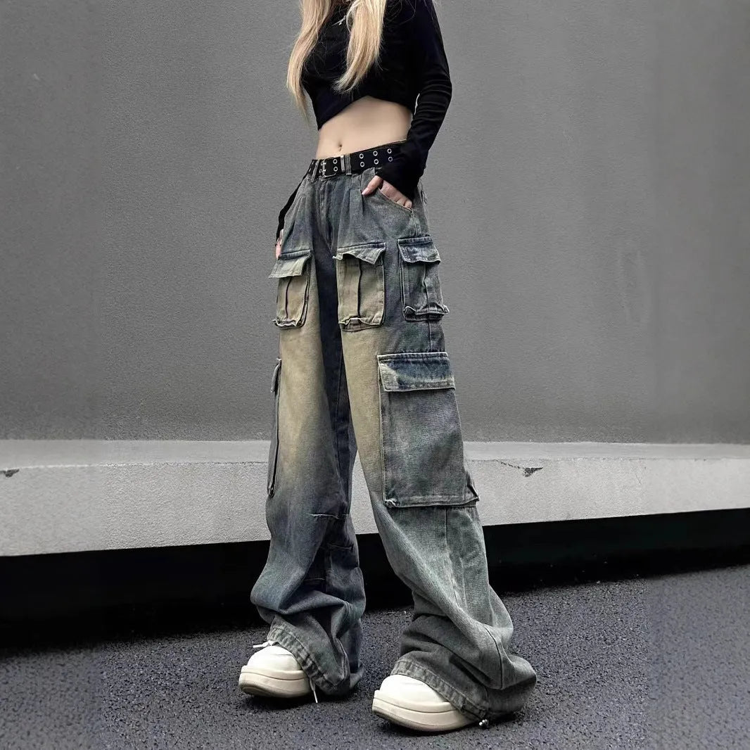 Loose fit multi-pocket distressed denim jeans in light blue wash straight-leg street style