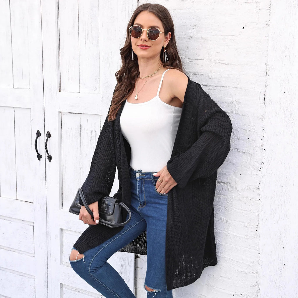 Women's loose fit brown acrylic sweater coat, open front cardigan style on hanger
