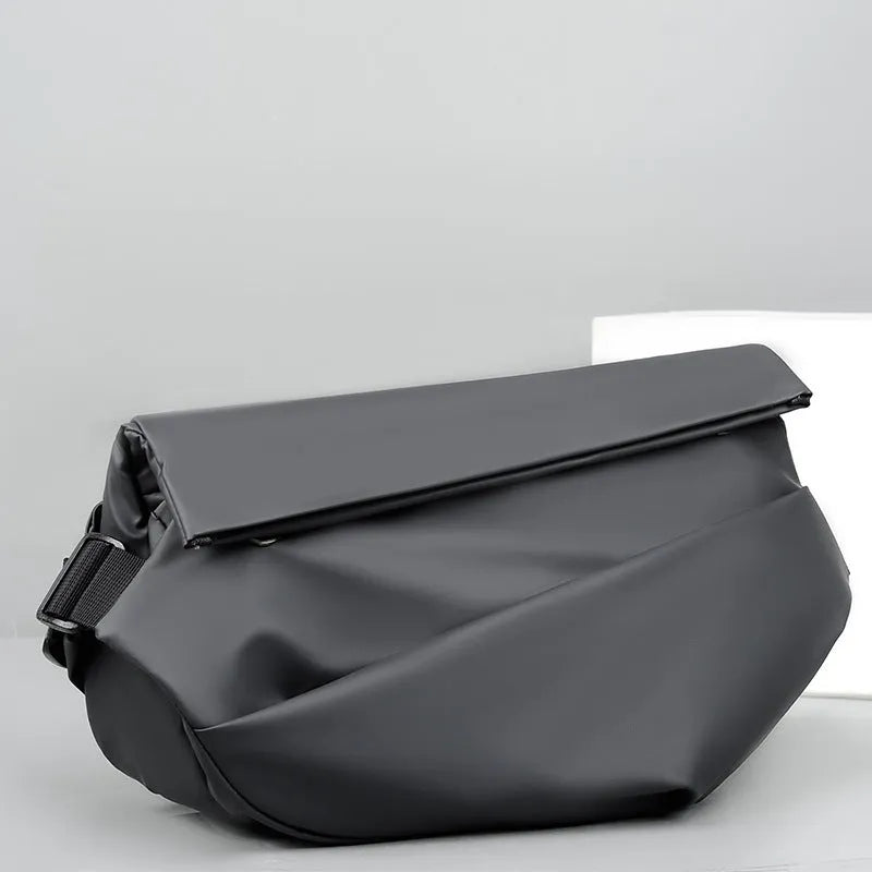 Grey PU leather crossbody bag showing internal phone and document compartments with zip opening