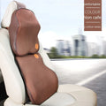 Car headrest neck pillow and lumbar support pillow set with memory foam filler on a car seat.