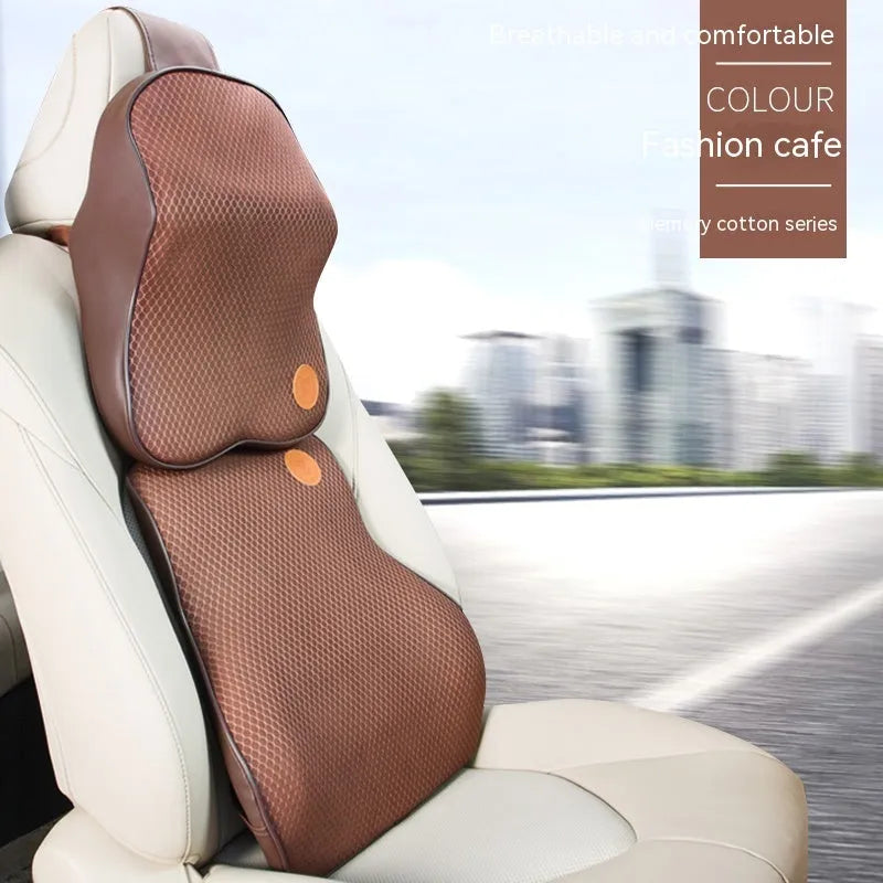 Car headrest neck pillow and lumbar support pillow set with memory foam filler on a car seat.