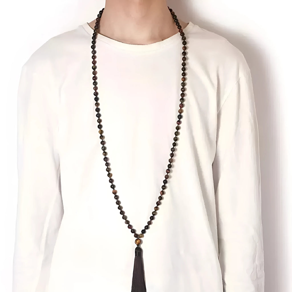 Long agate and amethyst tassel necklace with geometric beads in multiple colours on a 95-100cm chain.