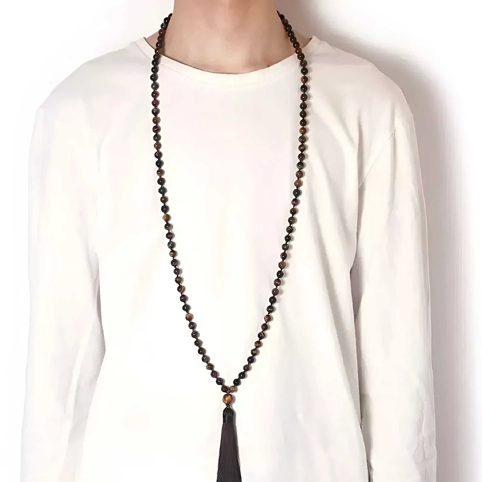 Long agate and amethyst tassel necklace with geometric beads in multiple colours on a 95-100cm chain.