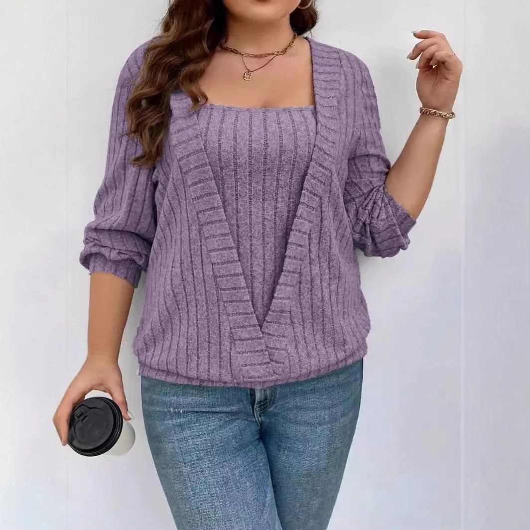 Women's solid colour V-neck false two-piece suit with long sleeves in a loose rib fabric fit.
