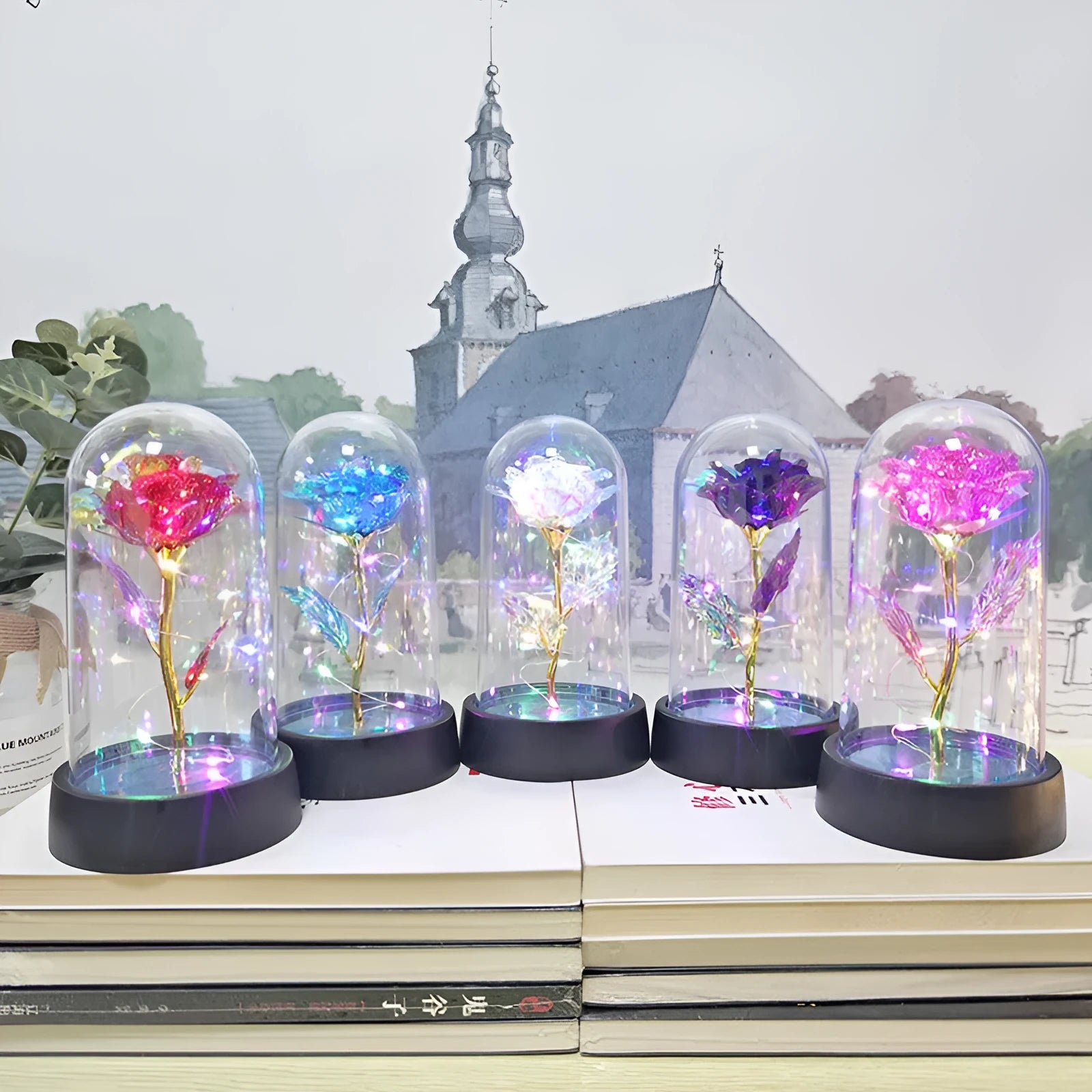 Small plastic night lamp with glass cover and plastic flowers, showing coloured LED light option.