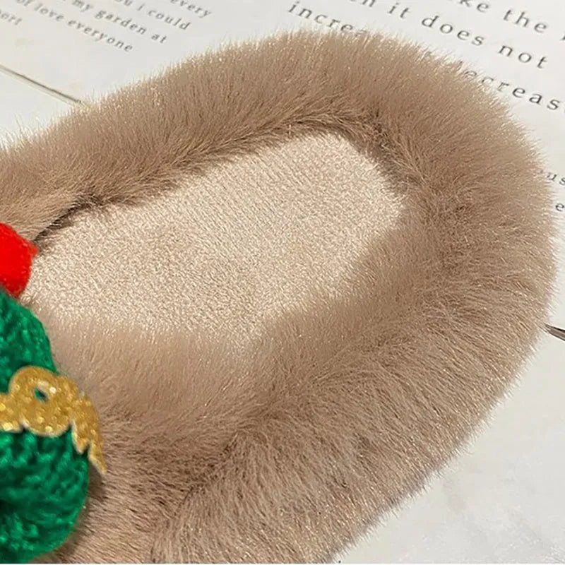 Women's faux plush slippers with a Christmas hat decoration, shown in a choice of colours.