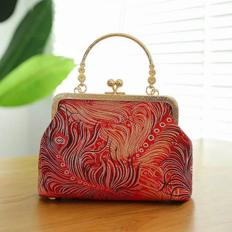 Chinese embroidery shell-shaped handbag in Chinese red with zipper changing bag