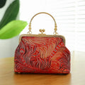 Chinese embroidery shell-shaped handbag in Chinese red with zipper changing bag