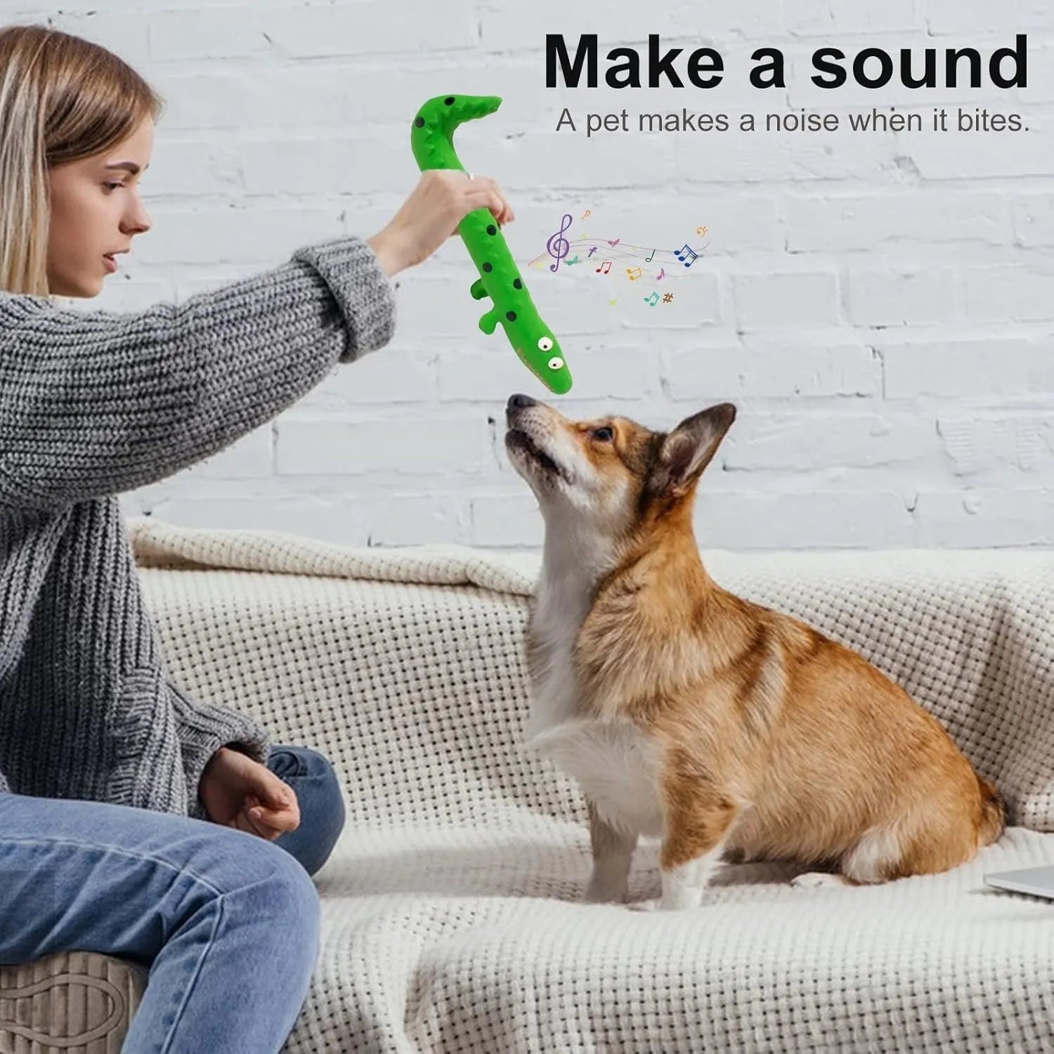 Green lizard-shaped dog chew toy with textured latex surface and squeaker function