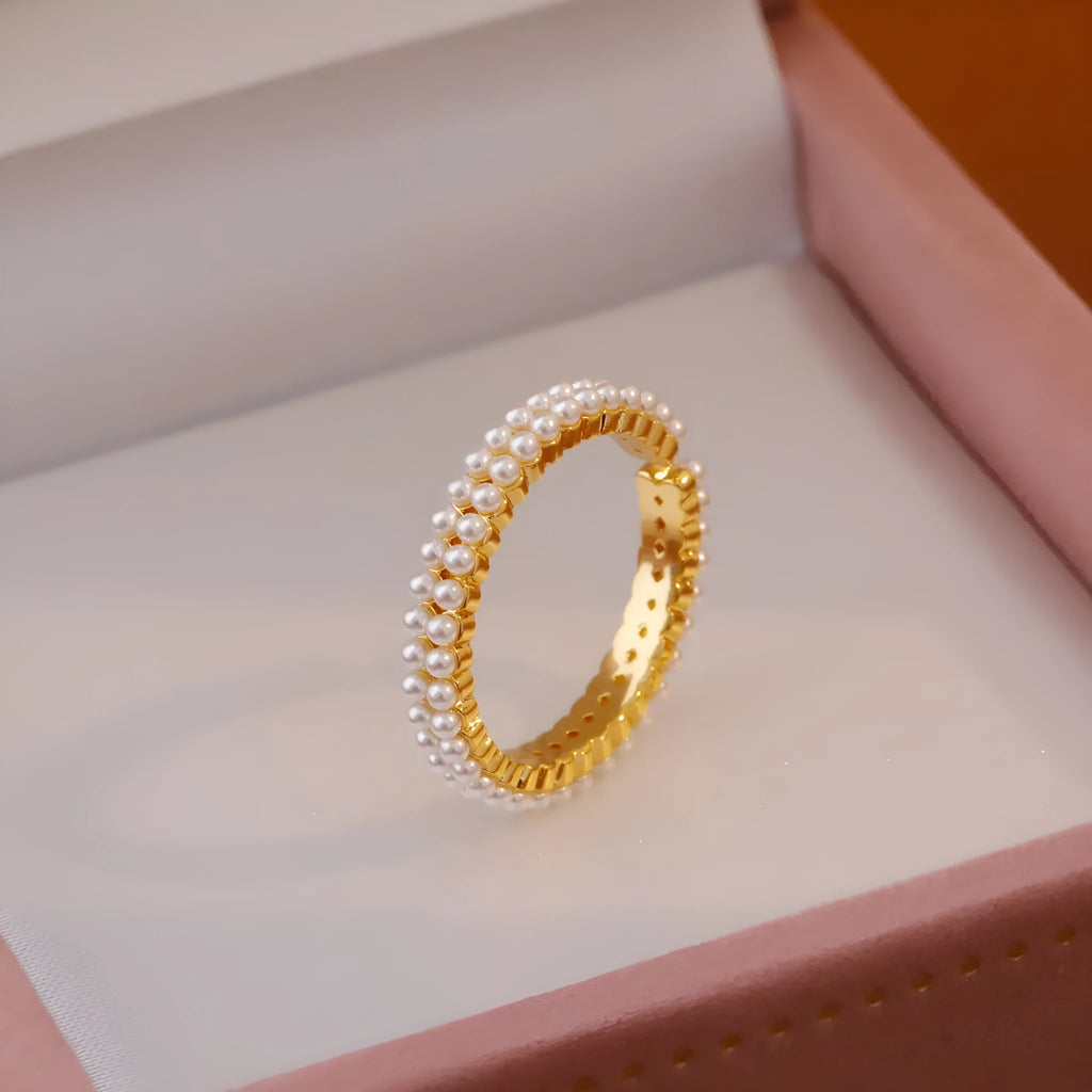 Gold geometric open mouth women's ring with pearl elements on electroplated copper