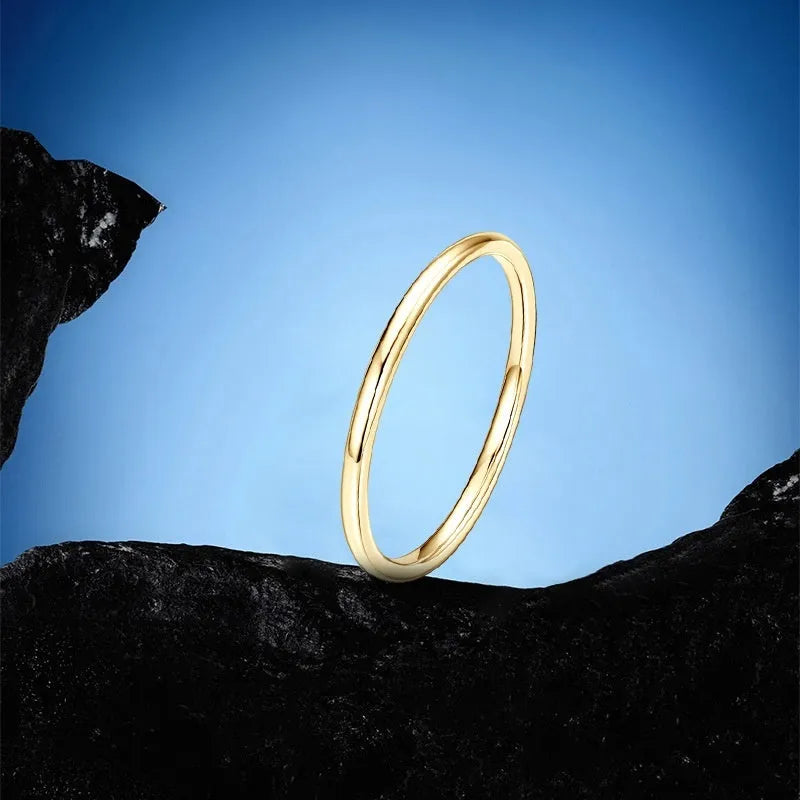 Geometric sterling silver bracelet ring with round design elements shown in three metal colour options