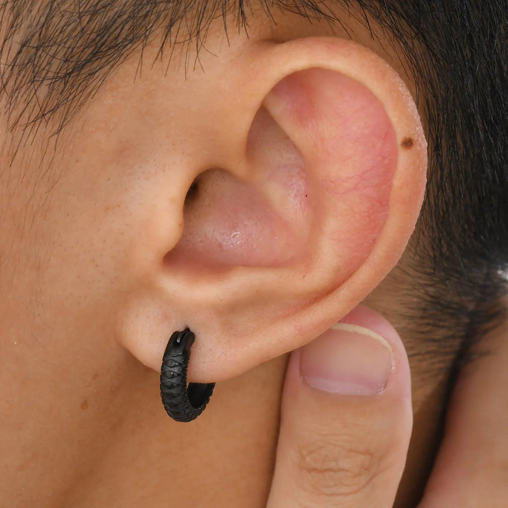 Stainless steel snake pattern earrings in black and gold finish, 30mm diameter