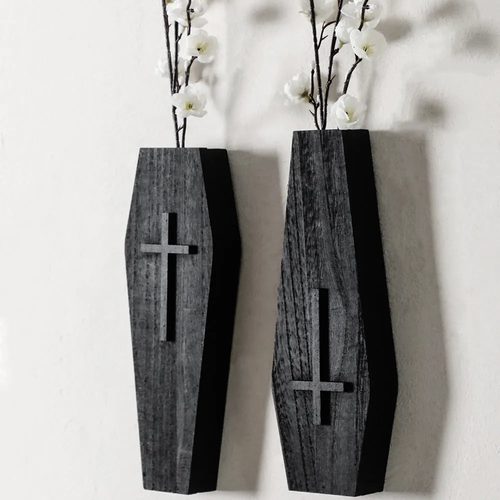 Black wooden cross wall vase shelf with open top for stems, 27cm tall, wall-mounted pendant design
