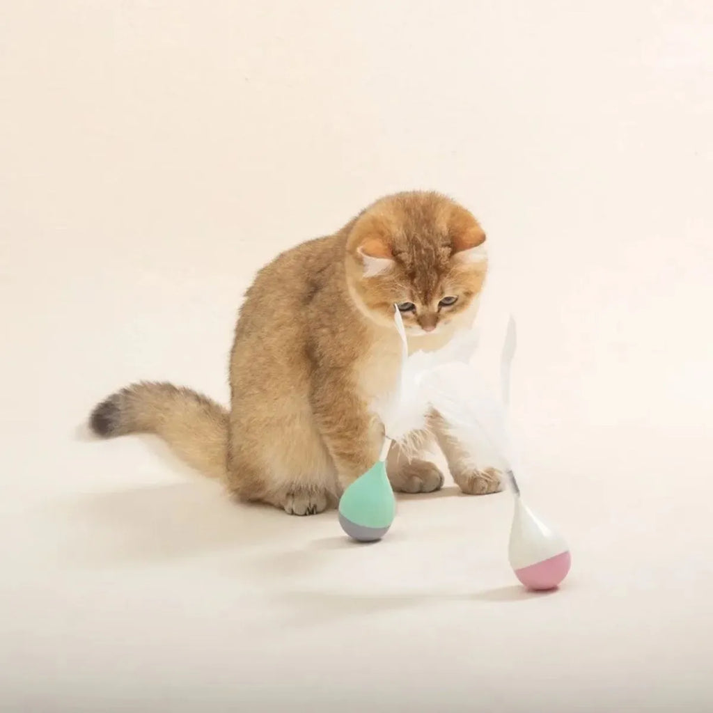 Feather tumbler cat toy with tease stick and self-healing ball in green colour
