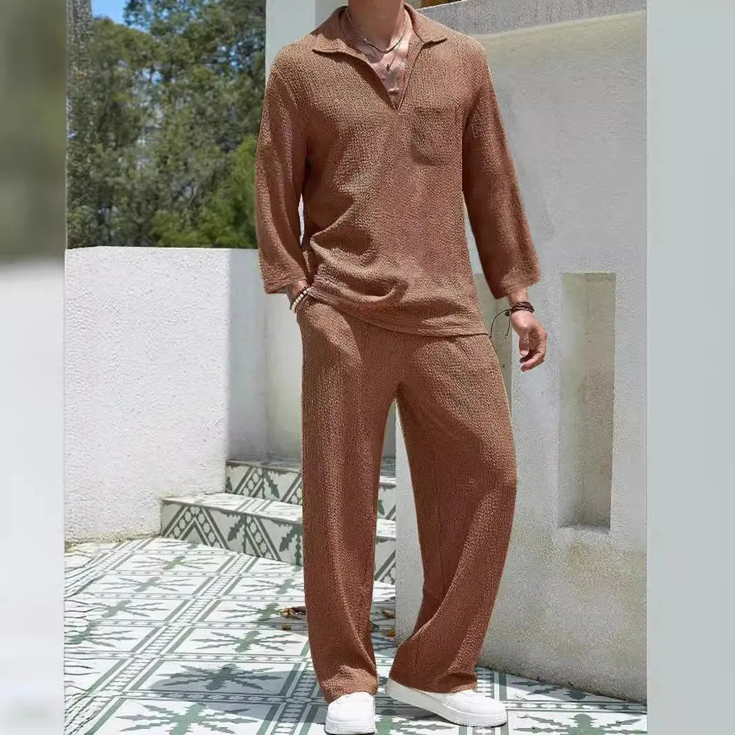 Men's casual shirt and trousers suit in polyester fabric, shown in one of four colours: lake blue, khaki, black, or caramel.