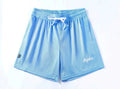 Men's black double-layer mesh sports shorts laid flat, showing waistband and loose fit.
