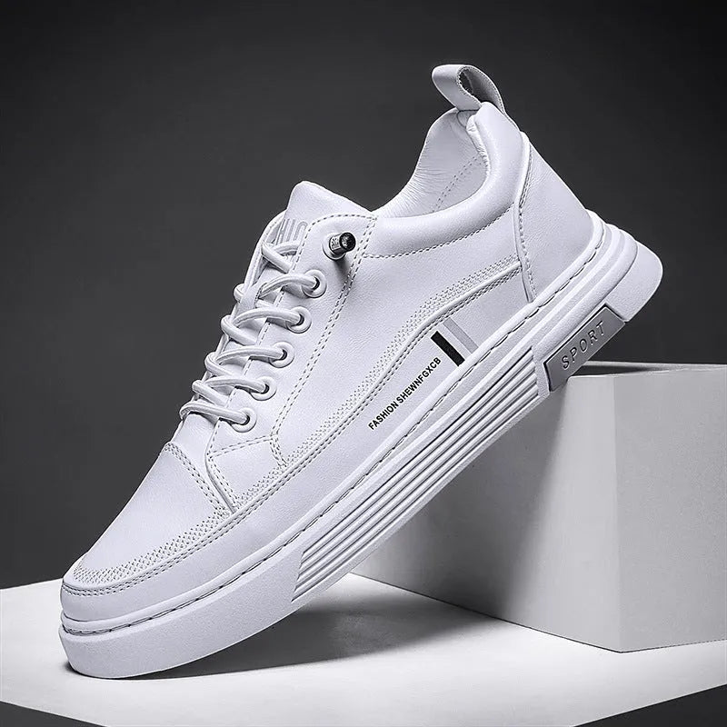 Men's white low-top skate shoes with an elastic band and round toe, on a rubber sole.