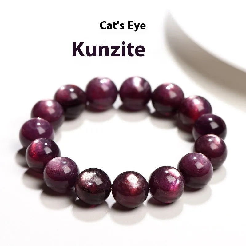 Natural purple lepidolite crystal round bead bracelet showing polished beads on a cord.