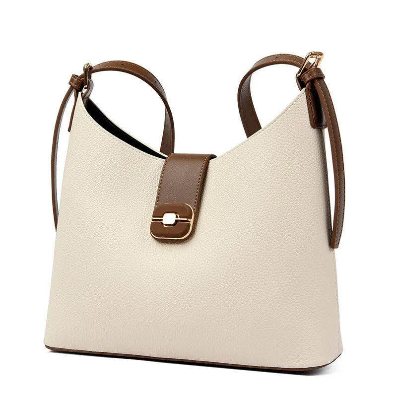 All-matching simple large-capacity bucket bag in black, urban simplicity style with stitching and lock detail