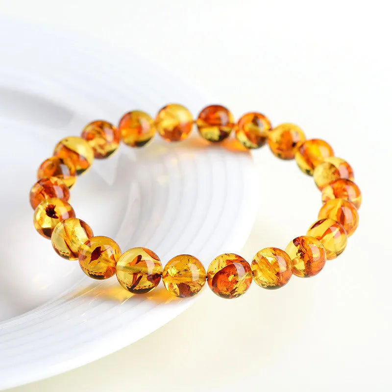 Natural yellow piebald amber bracelet with geometric beads for water purification therapy