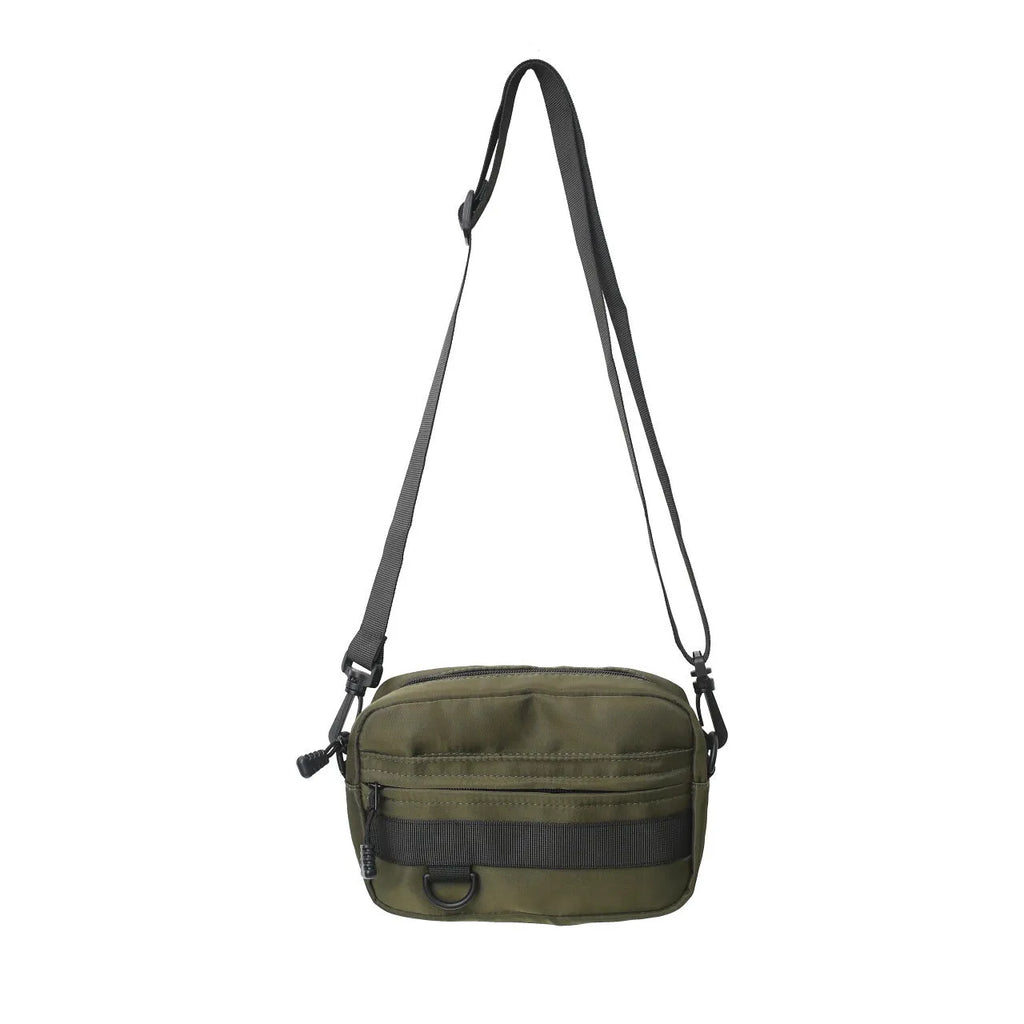 Men's solid colour polyester and nylon crossbody messenger bag shown in black, blue, green, or white.