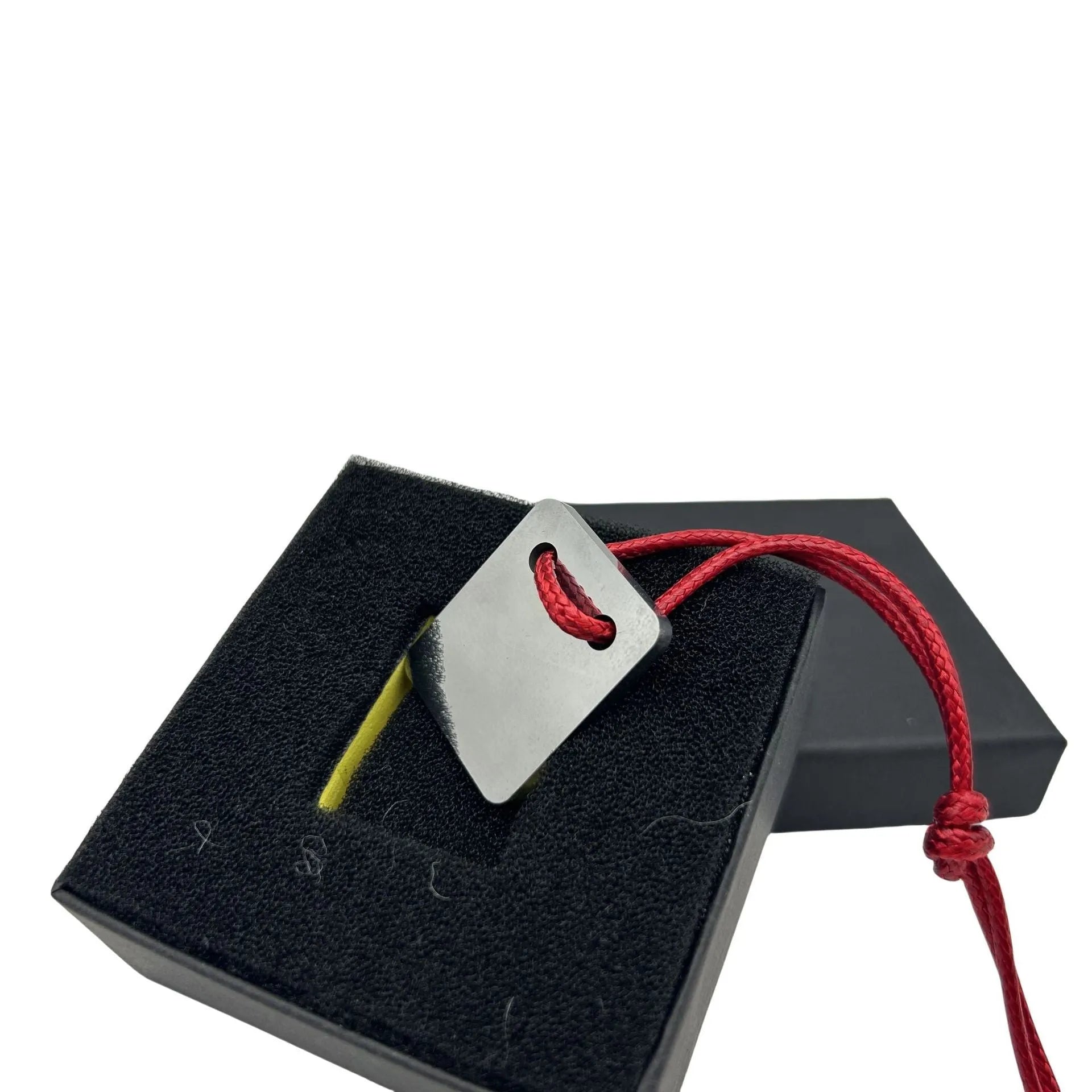 Silver metal car paint point repair scraper on surface