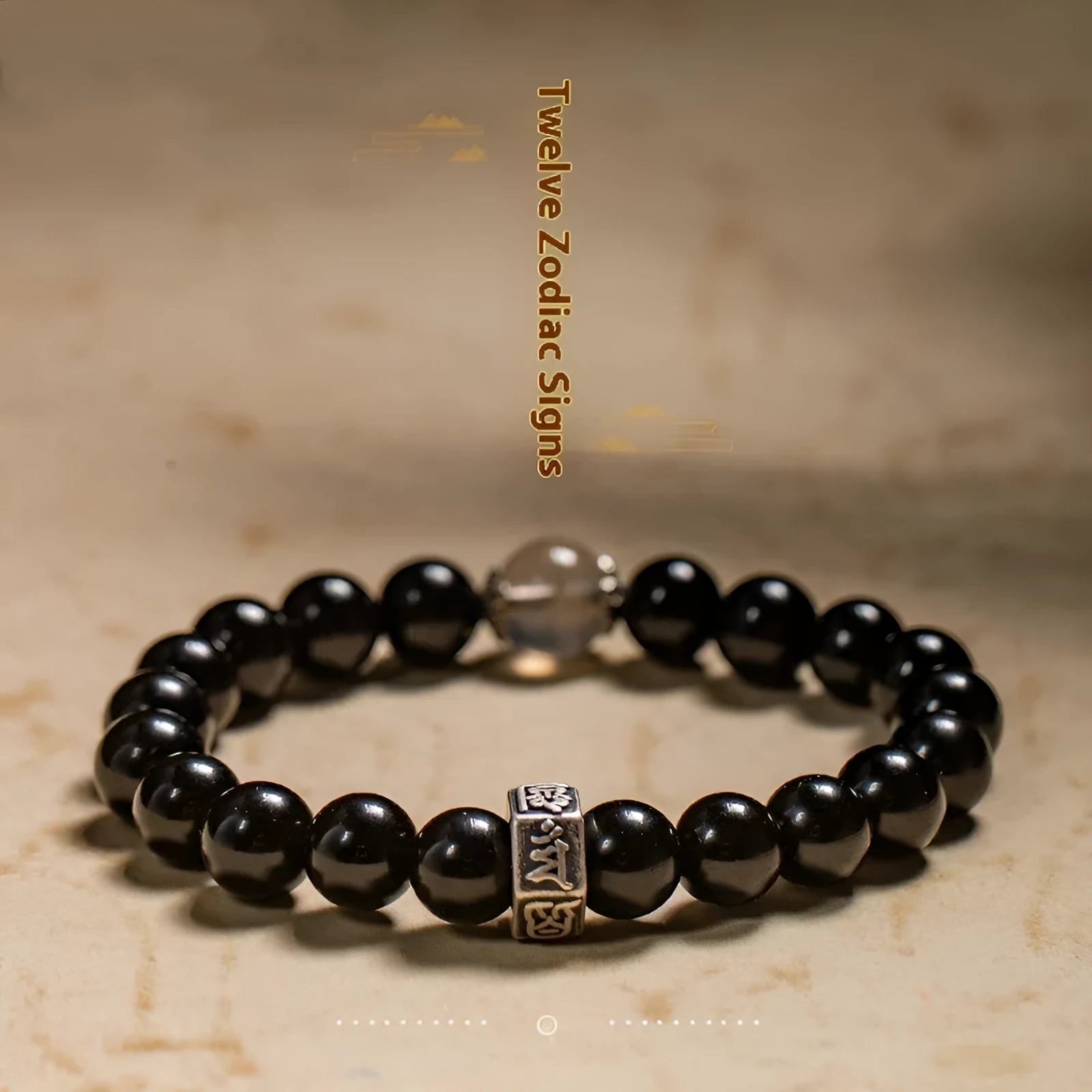 An ethnic-style women's bracelet made from 8mm obsidian beads with zodiac animal and Buddhist bodhisattva charms.