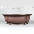 Handmade antique crabapple shaped purple clay flowerpot measuring 74x61x23cm