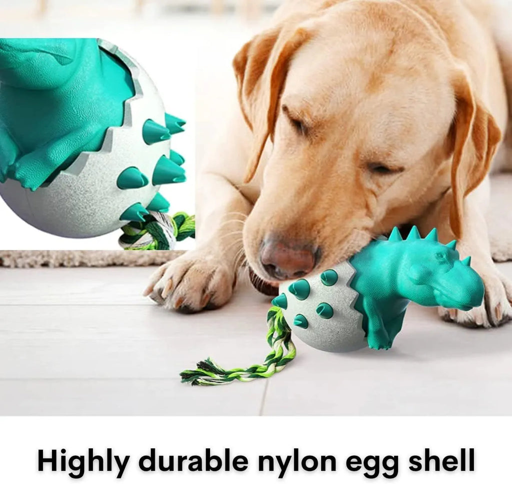 Blue dinosaur-shaped durable rubber dog chew toy with a knotted rope centre for aggressive chewers.