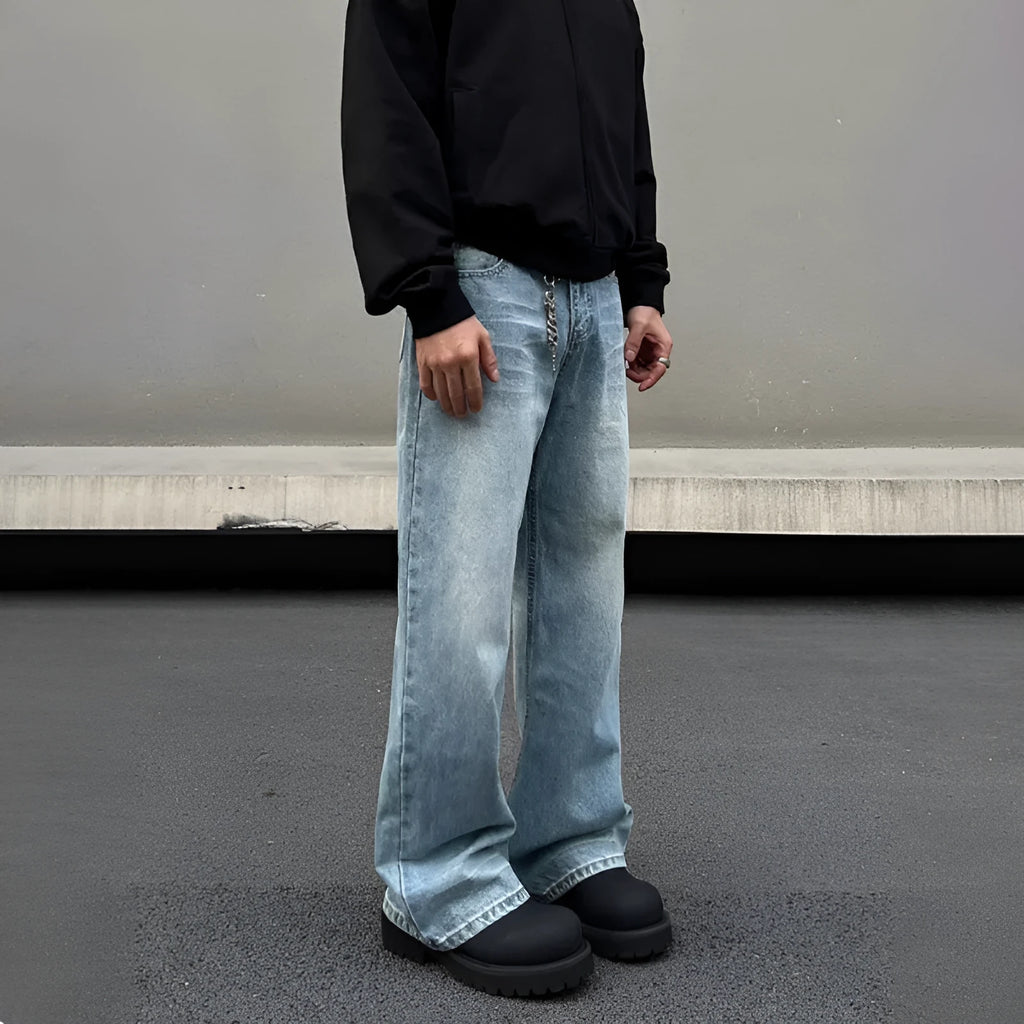 Men's retro whisker washed blue straight jeans with visible stitching and medium-high waist.