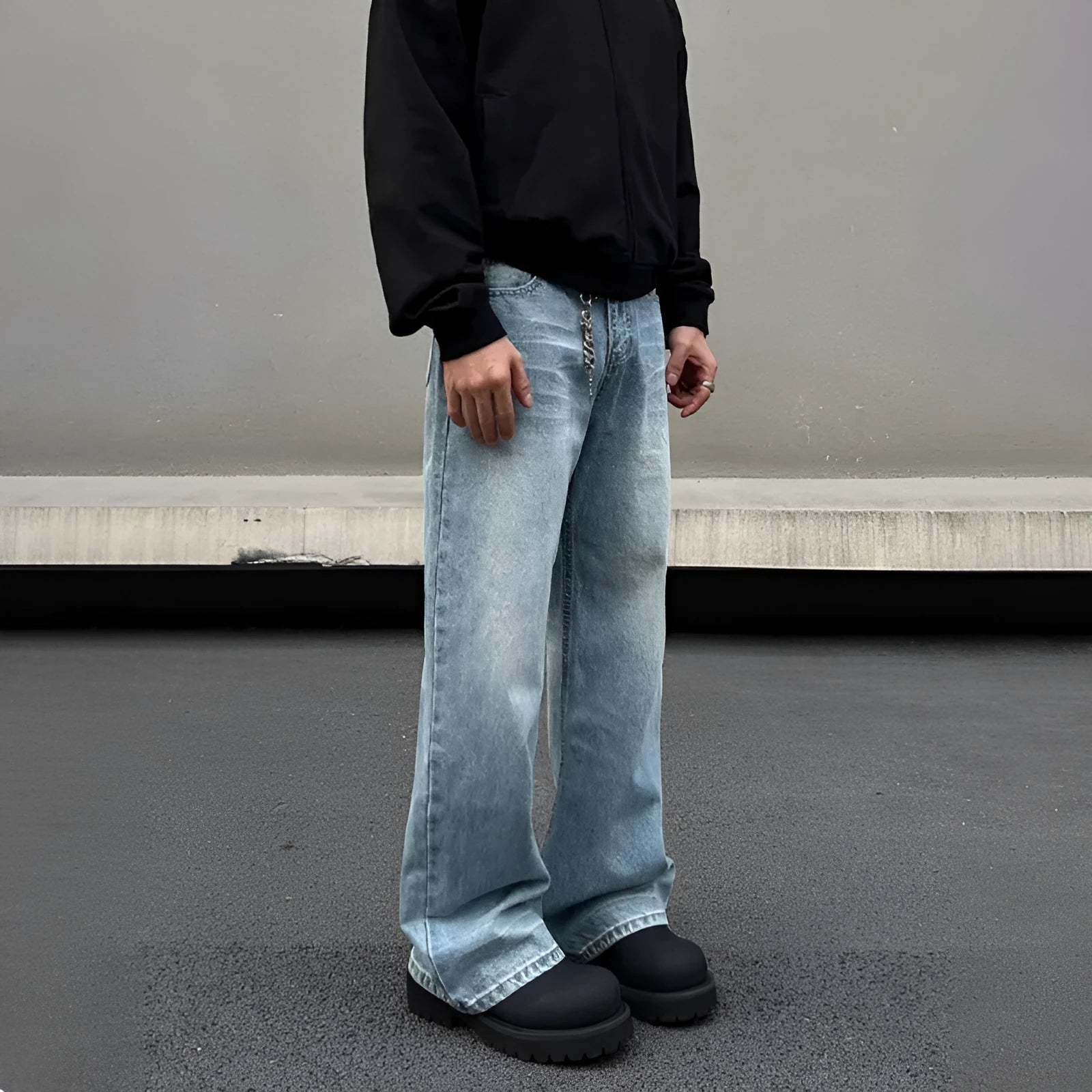 Men's retro whisker washed blue straight jeans with visible stitching and medium-high waist.