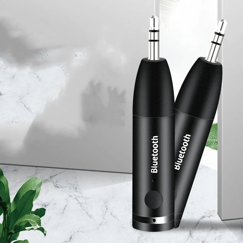 Black car AUX Bluetooth audio receiver with 3.5mm jack for wireless music streaming to car stereos