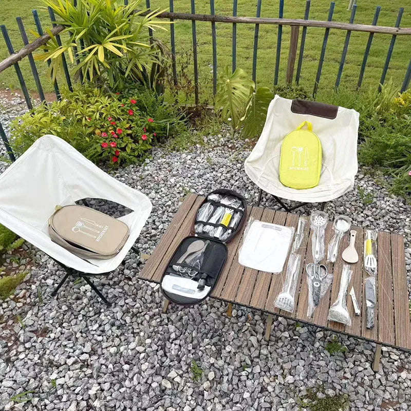 Khaki storage bag containing 12 pieces of stainless steel picnic cutlery including knives, forks and spoons.