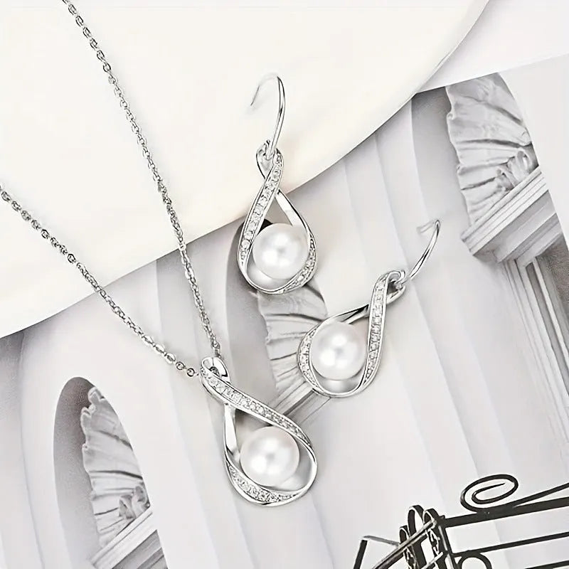 Simulated pearl necklace with diamond inlaid love heart pendant on alloy clavicle chain in gold finish